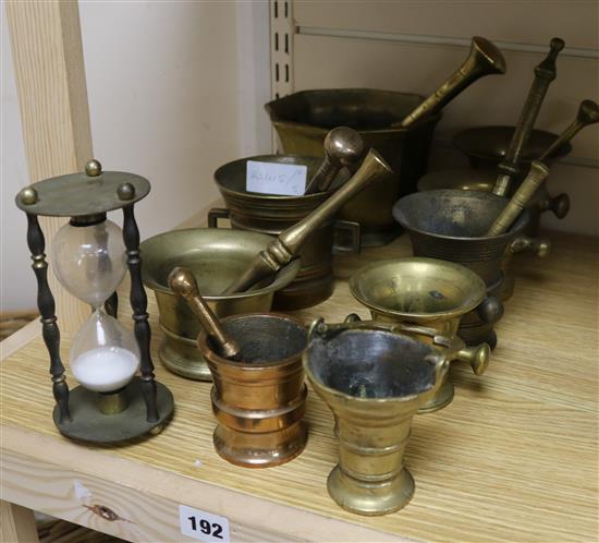 Seven mortars and pestles, two others and a timer